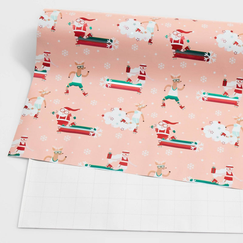 25 sq ft Roller Skating Santa Gift Wrap Pink - Wondershop (LOCAL PICKUP ONLY)