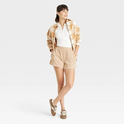 Women's Leisure Studio Mid-Thigh Fleece Shorts - Universal Thread Tan M